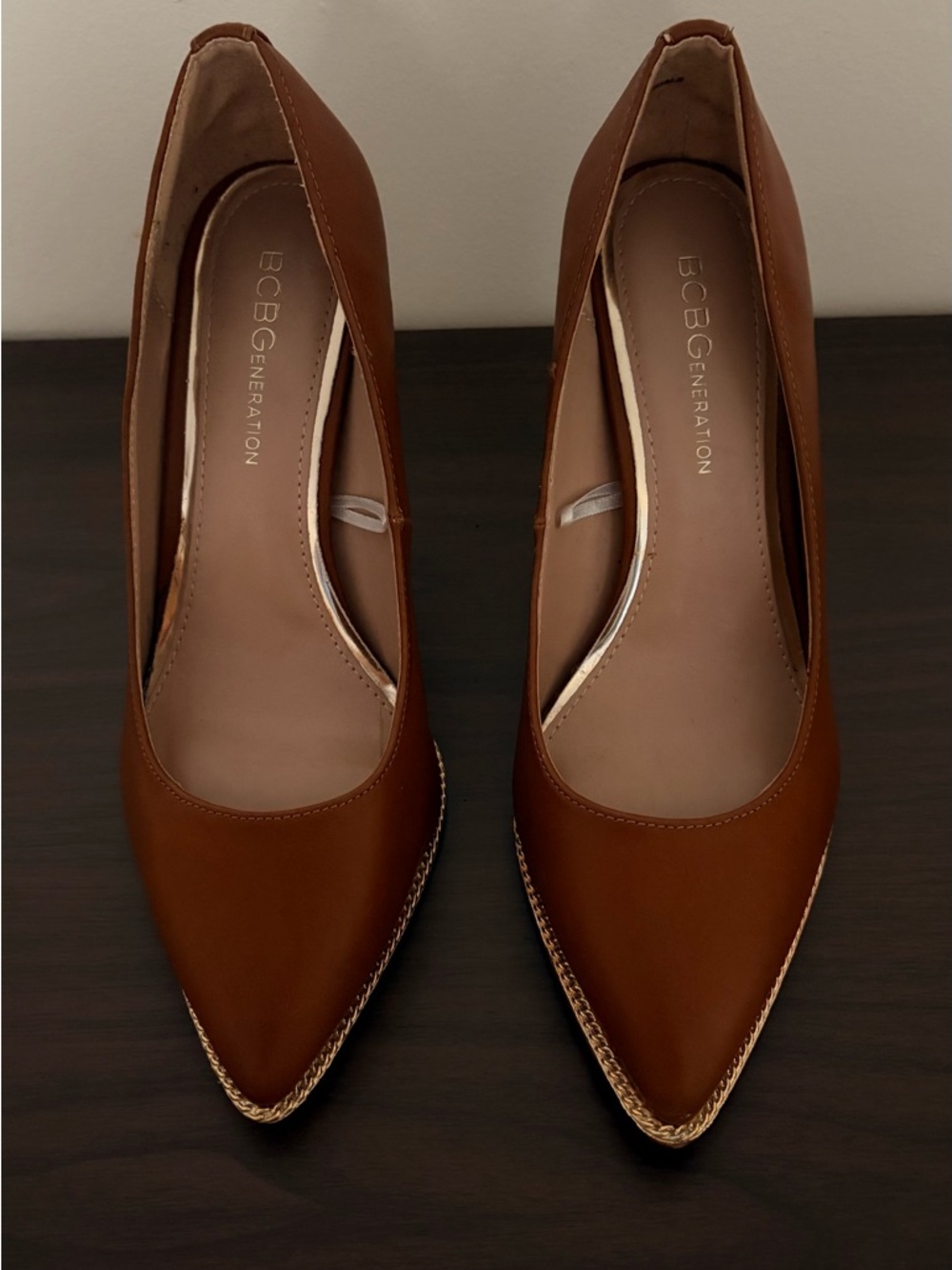 BCBGeneration Women's Brown Pointed Toe Pumps with Gold Trim